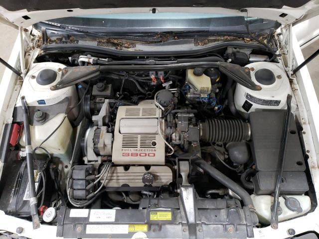 1G3EV13C3LU310515 - 1990 OLDSMOBILE TORONADO TROFEO WHITE photo 11