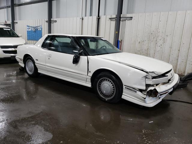 1G3EV13C3LU310515 - 1990 OLDSMOBILE TORONADO TROFEO WHITE photo 4