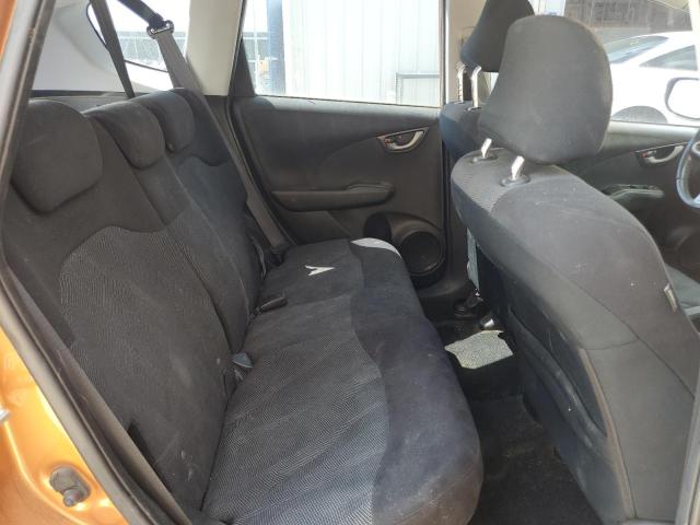 JHMGE88459S074858 - 2009 HONDA FIT SPORT ORANGE photo 10