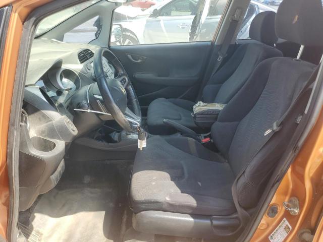 JHMGE88459S074858 - 2009 HONDA FIT SPORT ORANGE photo 7