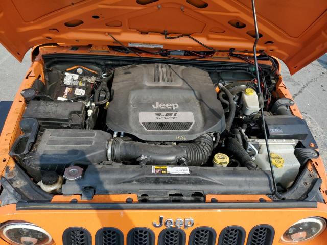 1C4AJWAGXCL187041 - 2012 JEEP WRANGLER SPORT 橙色 照片 11