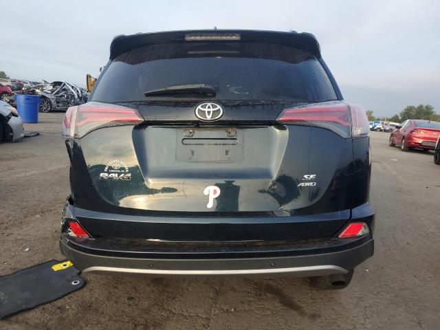 2T3JFREV0HW652295 - 2017 TOYOTA RAV4 SE შავი ფოტო 6