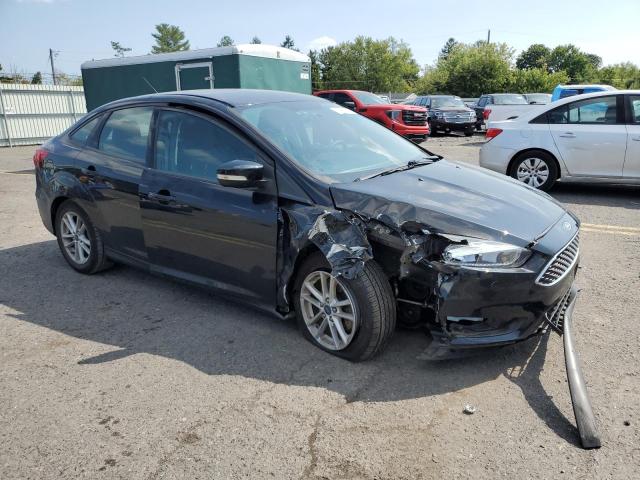 1FADP3F2XHL322099 - 2017 FORD FOCUS SE BLACK photo 4