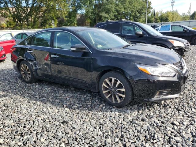 1N4AL3AP7GC199099 - 2016 NISSAN ALTIMA 2.5 BLACK photo 4