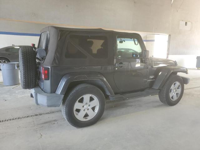 1J4AA5D15AL125149 - 2010 JEEP WRANGLER SAHARA Qara foto 3