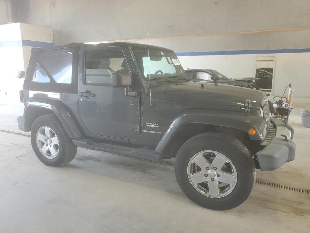 1J4AA5D15AL125149 - 2010 JEEP WRANGLER SAHARA Qara foto 4