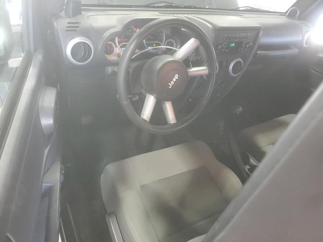 1J4AA5D15AL125149 - 2010 JEEP WRANGLER SAHARA Qara foto 8