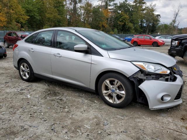 1FAHP3F27CL407041 - 2012 FORD FOCUS SE SILVER photo 4