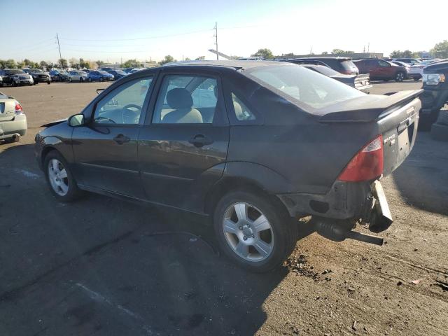 1FAFP34N45W135182 - 2005 FORD FOCUS ZX4 BLACK photo 2