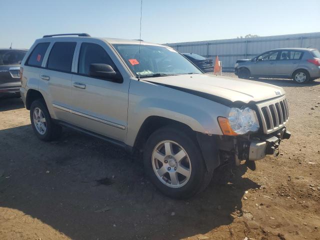 1J4PR4GK3AC135793 - 2010 JEEP GRAND CHER LAREDO Silber Foto 4