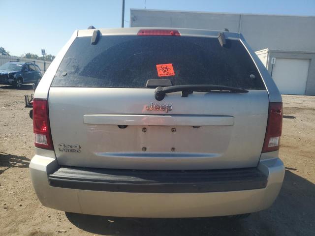 1J4PR4GK3AC135793 - 2010 JEEP GRAND CHER LAREDO Silber Foto 6