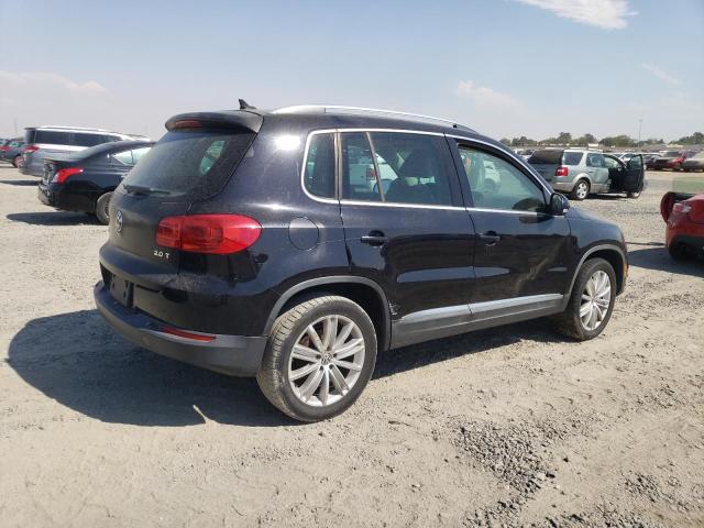 WVGAV7AX5CW582524 - 2012 VOLKSWAGEN TIGUAN S BLACK photo 3