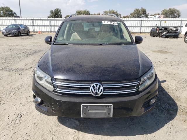 WVGAV7AX5CW582524 - 2012 VOLKSWAGEN TIGUAN S BLACK photo 5