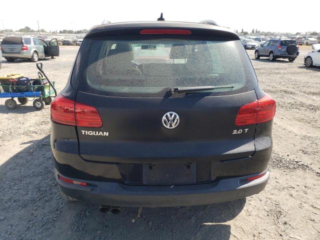 WVGAV7AX5CW582524 - 2012 VOLKSWAGEN TIGUAN S BLACK photo 6
