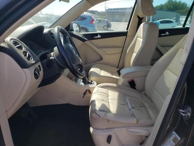 WVGAV7AX5CW582524 - 2012 VOLKSWAGEN TIGUAN S BLACK photo 7