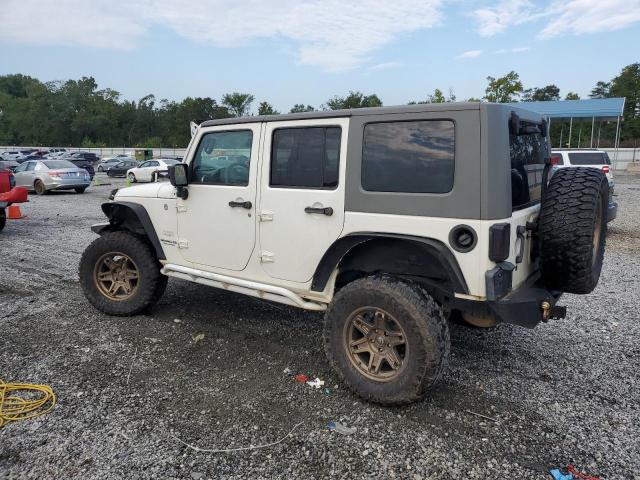 1J4BA5H14AL186457 - 2010 JEEP WRANGLER U SAHARA თეთრი ფოტო 2