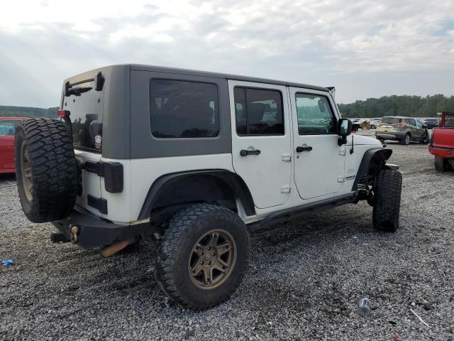 1J4BA5H14AL186457 - 2010 JEEP WRANGLER U SAHARA თეთრი ფოტო 3