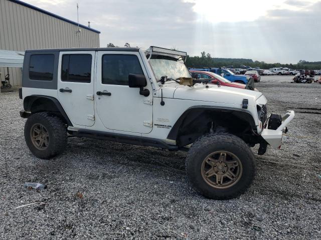 1J4BA5H14AL186457 - 2010 JEEP WRANGLER U SAHARA თეთრი ფოტო 4