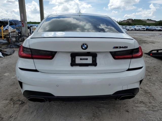 3MW5U7J07M8B60337 - 2021 BMW M340I WHITE photo 6