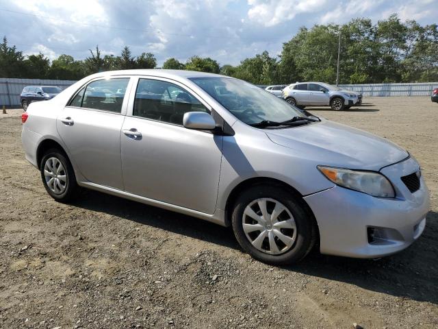 2T1BU4EEXAC535157 - 2010 TOYOTA COROLLA BASE SILVER photo 4