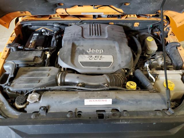 1C4BJWEG3CL223456 - 2012 JEEP WRANGLER U SAHARA ORANGE photo 12