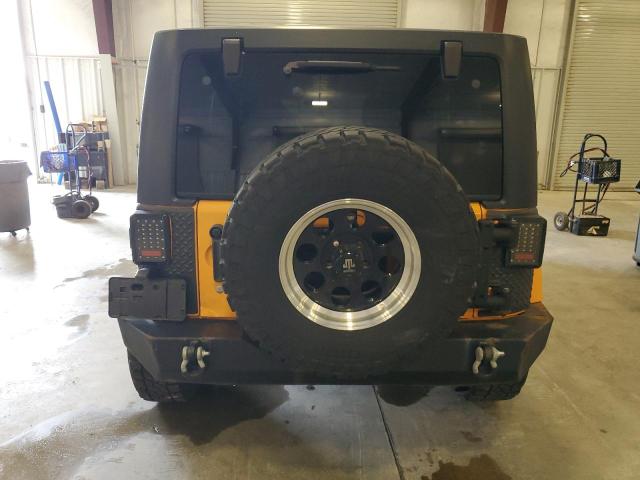 1C4BJWEG3CL223456 - 2012 JEEP WRANGLER U SAHARA ORANGE photo 6