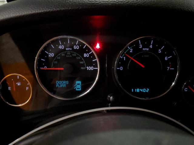 1C4BJWEG3CL223456 - 2012 JEEP WRANGLER U SAHARA ORANGE photo 9