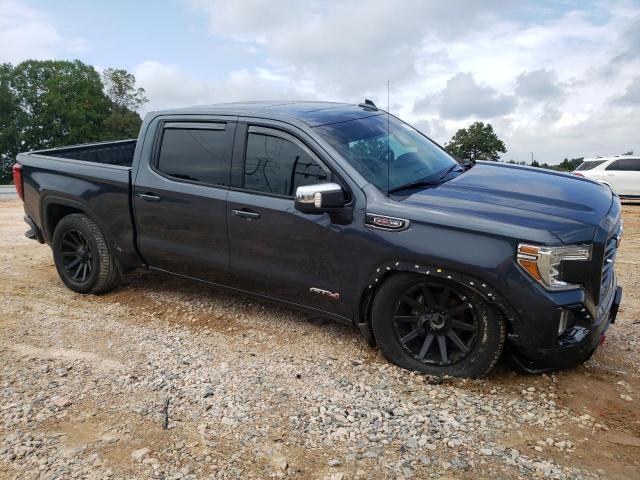 3GTP9EEL6KG171290 - 2019 GMC SIERRA K1500 AT4 GRAY photo 4