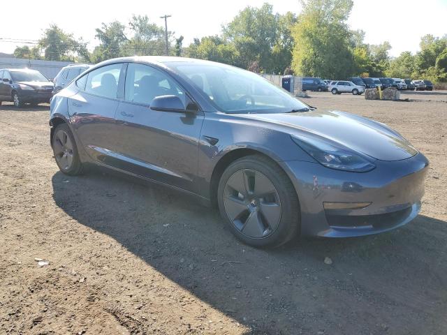 5YJ3E1EA7PF646931 - 2023 TESLA MODEL 3 GRAY photo 4