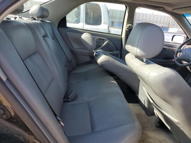 JT2BF28KX10299712 - 2001 TOYOTA CAMRY LE BLACK photo 10