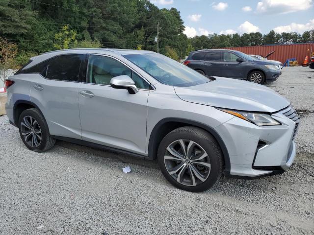 2T2ZZMCAXJC105091 - 2018 LEXUS RX 350 BASE SILVER photo 4