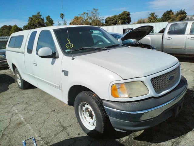 1FTRX17W31NB26974 - 2001 FORD F-150 WHITE photo 4