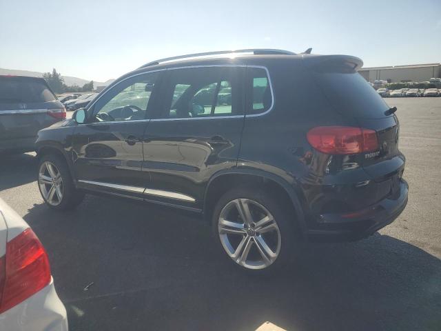 WVGAV7AX6GW038944 - 2016 VOLKSWAGEN TIGUAN S BLACK photo 2