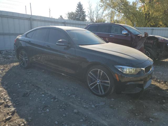 WBA4J7C57JBH14485 - 2018 BMW 440XI GRAN COUPE BLACK photo 4