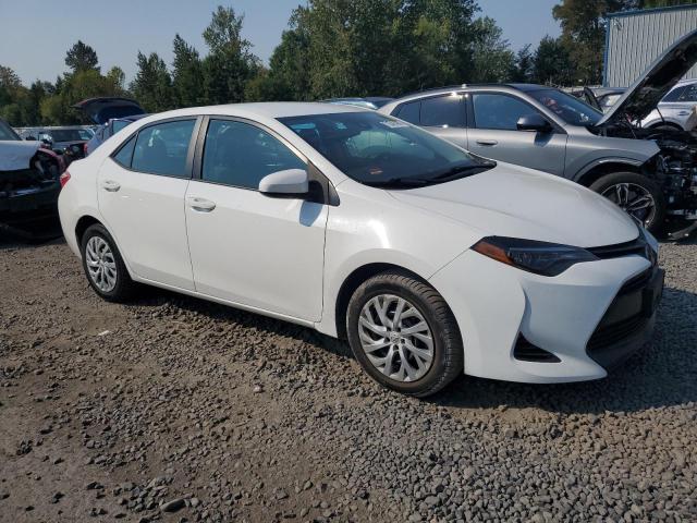 5YFBURHEXKP870297 - 2019 TOYOTA COROLLA L WHITE photo 4