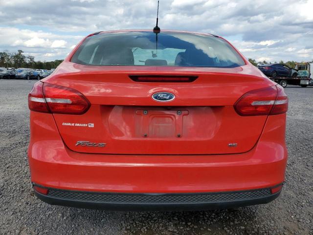 1FADP3F2XGL300814 - 2016 FORD FOCUS SE RED photo 6