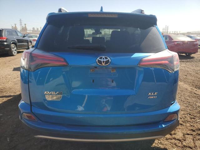 JTMRFREV6JJ735107 - 2018 TOYOTA RAV4 ADVENTURE BLUE photo 6