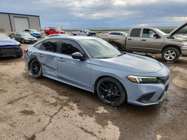 2HGFE2F54NH558996 - 2022 HONDA CIVIC SPORT Blau Foto 4