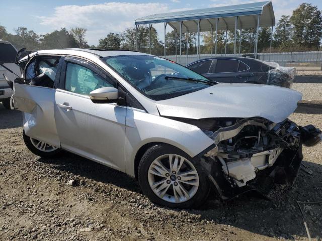 1FAHP3M27CL334059 - 2012 FORD FOCUS SEL SILVER photo 4