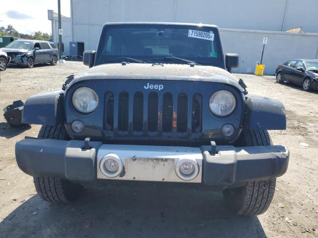 1C4AJWBG4EL196867 - 2014 JEEP WRANGLER SAHARA შავი ფოტო 5