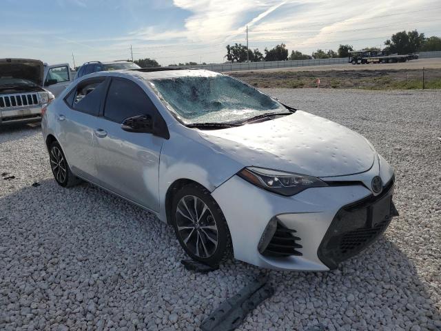 5YFBURHE5HP581126 - 2017 TOYOTA COROLLA L SILVER photo 4