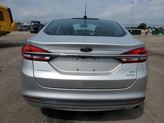 3FA6P0HDXJR239415 - 2018 FORD FUSION SE SILVER photo 6