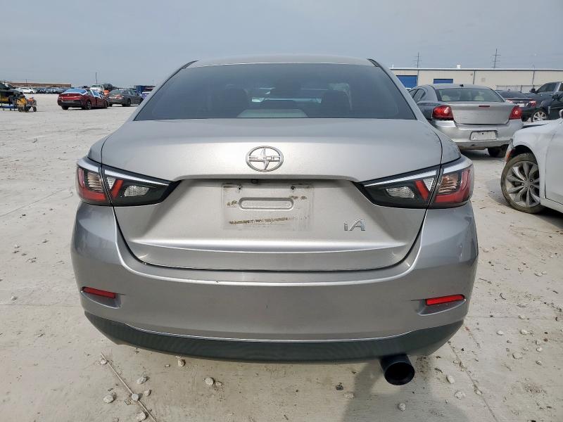 3MYDLBZV4GY104771 - 2016 TOYOTA SCION IA GRAY photo 6