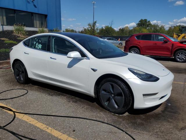 5YJ3E1EA1HF000821 - 2017 TESLA MODEL 3 WHITE photo 4