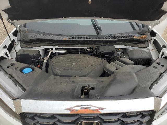 5FNYF8H58PB044081 - 2023 HONDA PASSPORT EXL WHITE photo 12