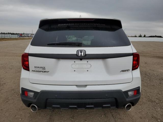 5FNYF8H58PB044081 - 2023 HONDA PASSPORT EXL WHITE photo 6
