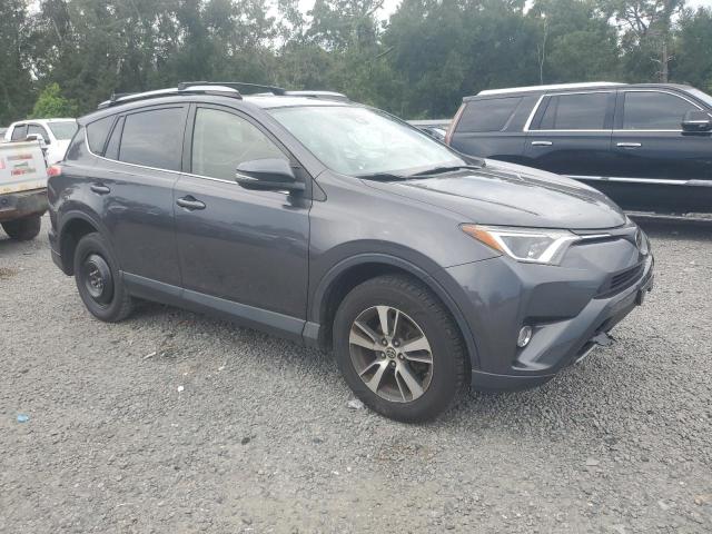 JTMRFREVXHJ149245 - 2017 TOYOTA RAV4 XLE GRAY photo 4