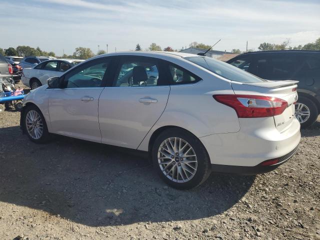 1FAHP3H21CL283233 - 2012 FORD FOCUS SEL WHITE photo 2