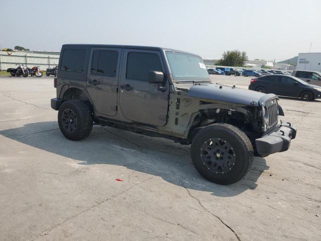 1C4BJWDG3JL907275 - 2018 JEEP WRANGLER U SPORT فحمي صورة 4