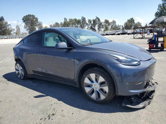 7SAYGAEE0PF836687 - 2023 TESLA MODEL Y Արծաթագույն լուսանկար 4